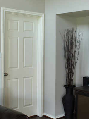 Making Your Doors Pretty With Molding (and a How-to)