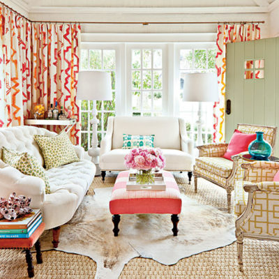 Layered Cowhide in Sunroom | www.decorchick.com